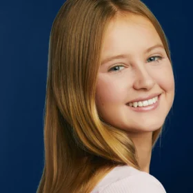 Girl showing results after orthodontic treatment | Anthony Patel Orthodontics - Fort Worth, TX